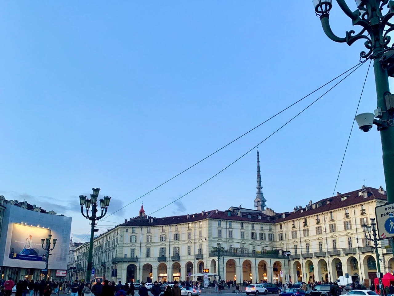 Piazza Vittorio Veneto with the Mole Antonelliana visible behind the porticoes.