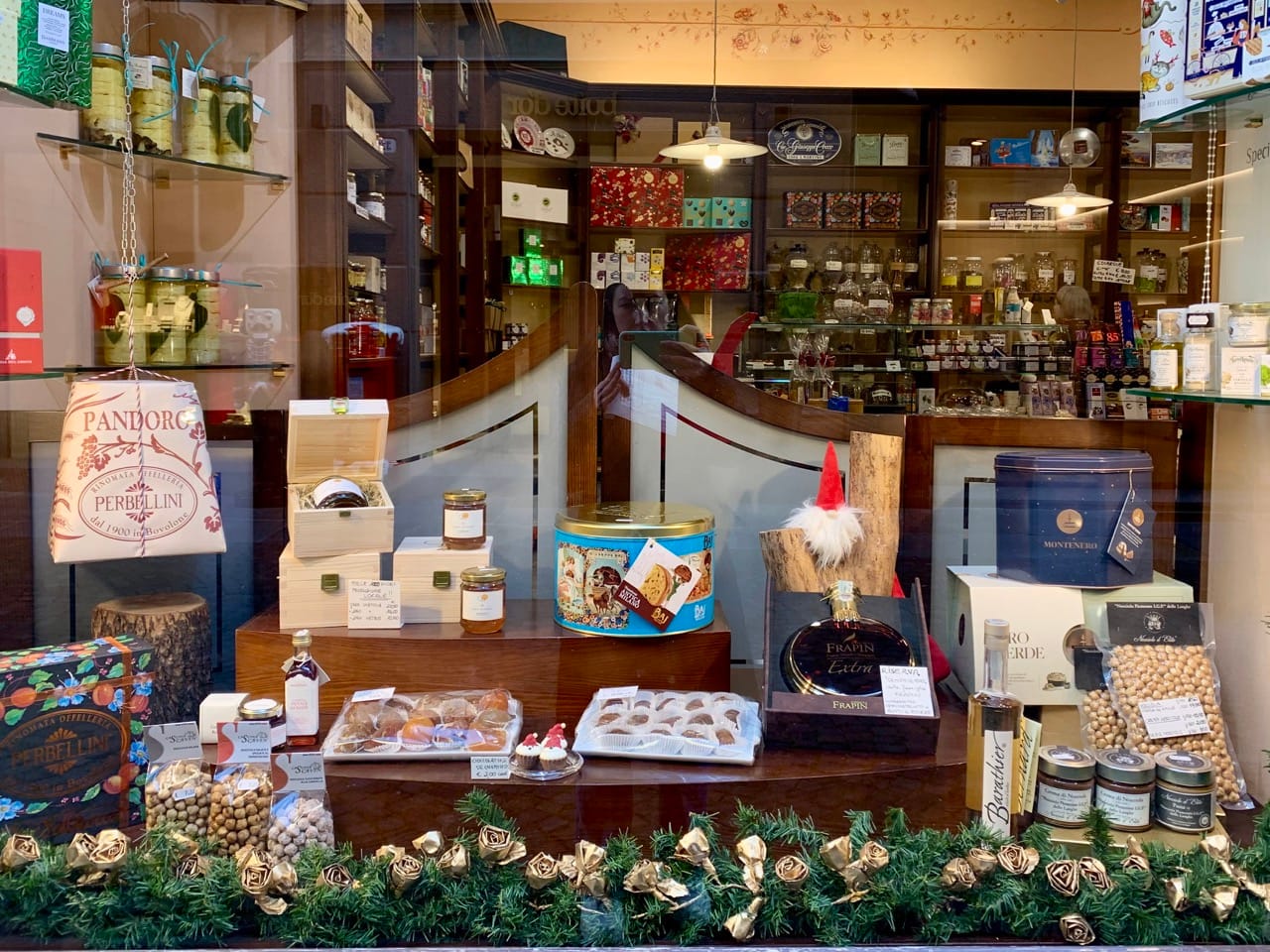 Traditional Piedmontese sweets and panettone on display in Alba.