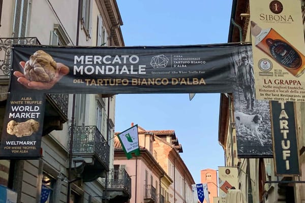 Banners above the entrance to the White Truffle World Market.